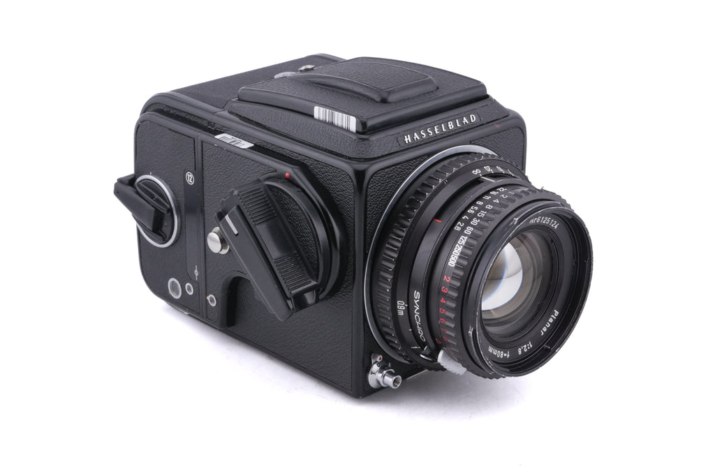 Hasselblad 500C/M (Black, 10170) + 80mm f2.8 Planar T* C (Black, 20028) + A12 Film Magazine (Black, 30147) + Waist Level Finder (Old / Black, 42277) + Acute Matte Focusing Screen (42165)