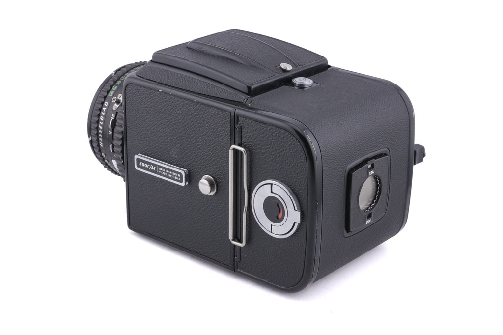 Hasselblad 500C/M (Black, 10170) + 80mm f2.8 Planar T* C (Black, 20028) + A12 Film Magazine (Black, 30147) + Waist Level Finder (Old / Black, 42277) + Acute Matte Focusing Screen (42165)
