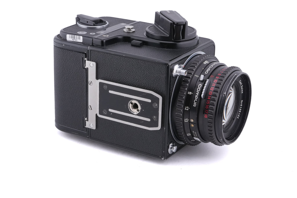 Hasselblad 500C/M (Black, 10170) + 80mm f2.8 Planar T* C (Black, 20028) + A12 Film Magazine (Black, 30147) + Waist Level Finder (Old / Black, 42277) + Acute Matte Focusing Screen (42165)