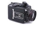 Hasselblad 500C/M (Black, 10170) + 80mm f2.8 Planar T* C (Black, 20028) + A12 Film Magazine (Black, 30147) + Waist Level Finder (Old / Black, 42277) + Acute Matte Focusing Screen (42165)