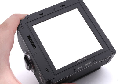 Hasselblad 503CX (10026 / 10172) + 80mm f2.8 Planar T* CB + A12 Film Magazine (Black, 30147) + Waist Level Finder (New / Black, 42323) + Acute Matte Focusing Screen (42165)