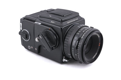 Hasselblad 503CX (10026 / 10172) + 80mm f2.8 Planar T* CB + A12 Film Magazine (Black, 30147) + Waist Level Finder (New / Black, 42323) + Acute Matte Focusing Screen (42165)