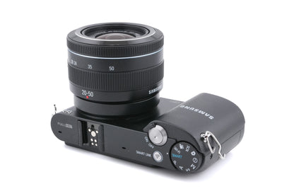 Samsung NX1000 + 20-50mm f3.5-5.6 II ED i-Function + SEF8A Flash