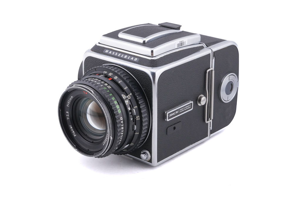 Hasselblad 500C/M (Silver, 10026) + 80mm f2.8 Planar T* C (Black, 20028) + A12 Film Magazine (Silver, 30074) + Waist Level Finder (New / Chrome, 42315) + Lens Shade 80 (40118/SEMOC) + Acute Matte Focusing Screen (42165) + Checked Screen (42072/TILMC)