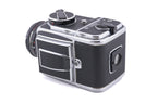Hasselblad 500C/M (Silver, 10026) + 80mm f2.8 Planar T* C (Black, 20028) + A12 Film Magazine (Silver, 30074) + Waist Level Finder (New / Chrome, 42315) + Lens Shade 80 (40118/SEMOC) + Acute Matte Focusing Screen (42165) + Checked Screen (42072/TILMC)