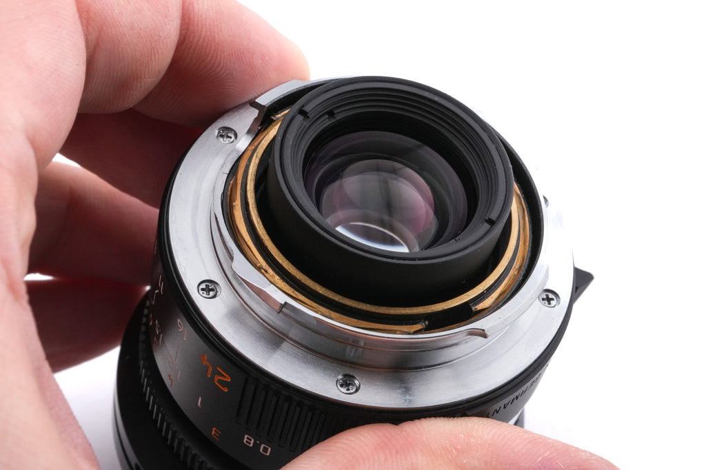 Leica 24mm f2.8 Elmarit-M ASPH. (Black, 11878) + Lens Hood (21mm f2.8 / 24mm f2.8 / 28-35-50mm f4) (12592)