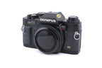 Olympus OM40 Program
