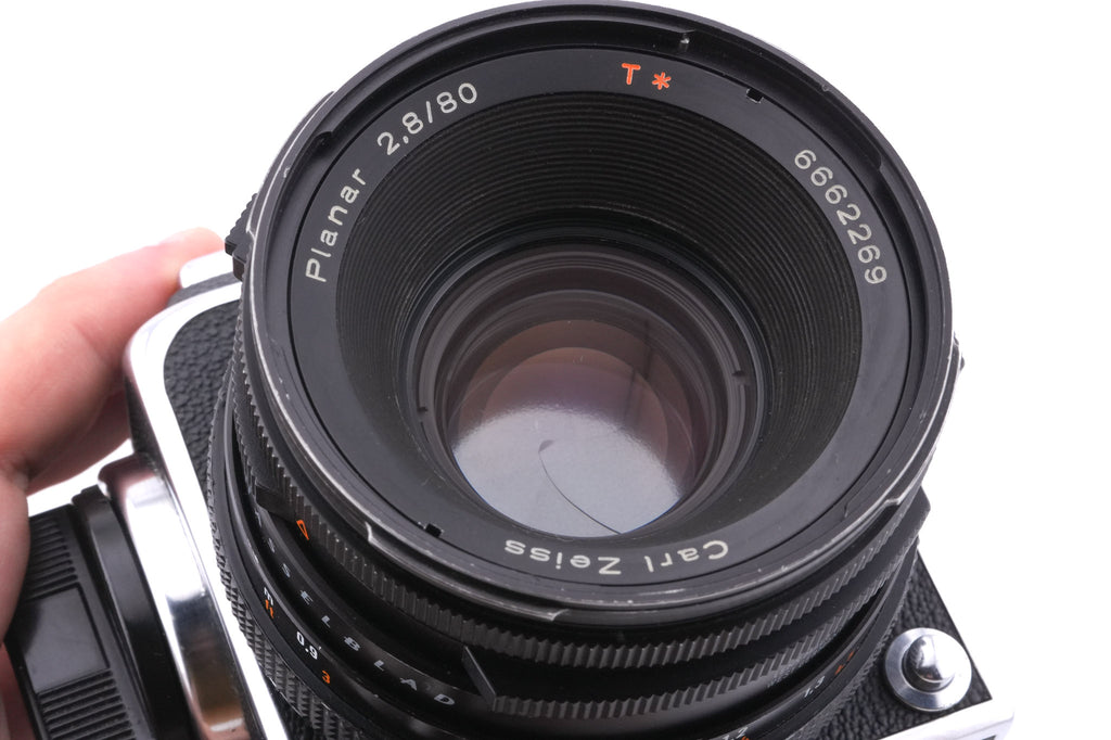 Hasselblad 500C/M (Silver, 10026) + 80mm f2.8 Planar T* CF (20029) + A12 Film Magazine (Silver, 30074) + Waist Level Finder (Old / Silver, 42021) + Standard Focusing Screen (42161)