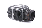 Hasselblad 500C/M (Silver, 10026) + 80mm f2.8 Planar T* CF (20029) + A12 Film Magazine (Silver, 30074) + Checked Focusing Screen with Central Grid (42250) + Waist Level Finder (Old / Silver, 42021)