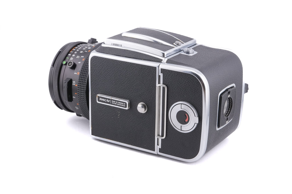 Hasselblad 500C/M (Silver, 10026) + 80mm f2.8 Planar T* CF (20029) + A12 Film Magazine (Silver, 30074) + Checked Focusing Screen with Central Grid (42250) + Waist Level Finder (Old / Silver, 42021)