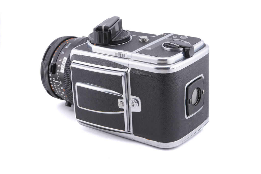 Hasselblad 500C/M (Silver, 10026) + 80mm f2.8 Planar T* CF (20029) + A12 Film Magazine (Silver, 30074) + Checked Focusing Screen with Central Grid (42250) + Waist Level Finder (Old / Silver, 42021)