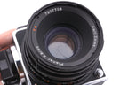 Hasselblad 500C/M (Silver, 10026) + 80mm f2.8 Planar T* CF (20029) + A12 Film Magazine (Silver, 30074) + Checked Focusing Screen with Central Grid (42250) + Waist Level Finder (Old / Silver, 42021)