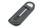 A close-up of a handheld plastic device on a white background. For 35mm film canister.