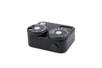 A black Doomo Meter D hot shoe light meter from the top with a white background.
