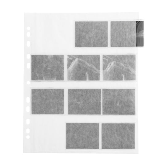 Pergamine paper sleeves with negatives on a white background. For 120mm medium format negatives.