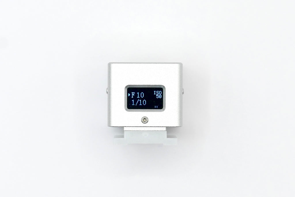 The KMQ chrome back display model from backside on a white background.