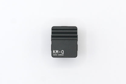 The KMQ black back display model from topside on a white background.