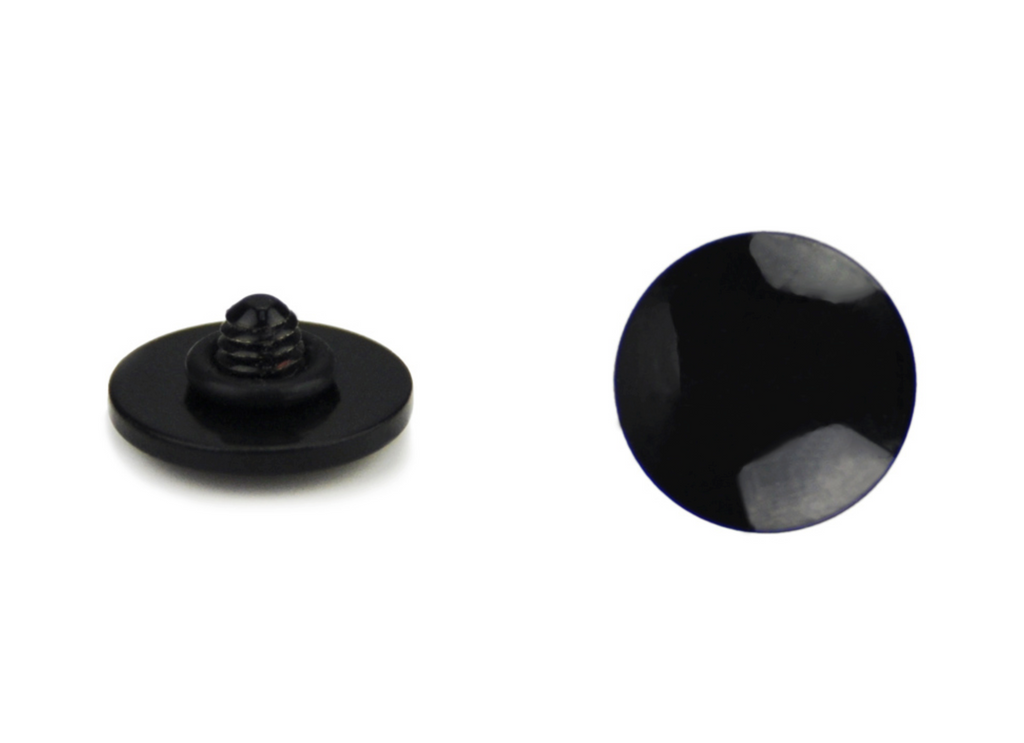 A close-up of JJC soft release button from the front and top on a white background. 