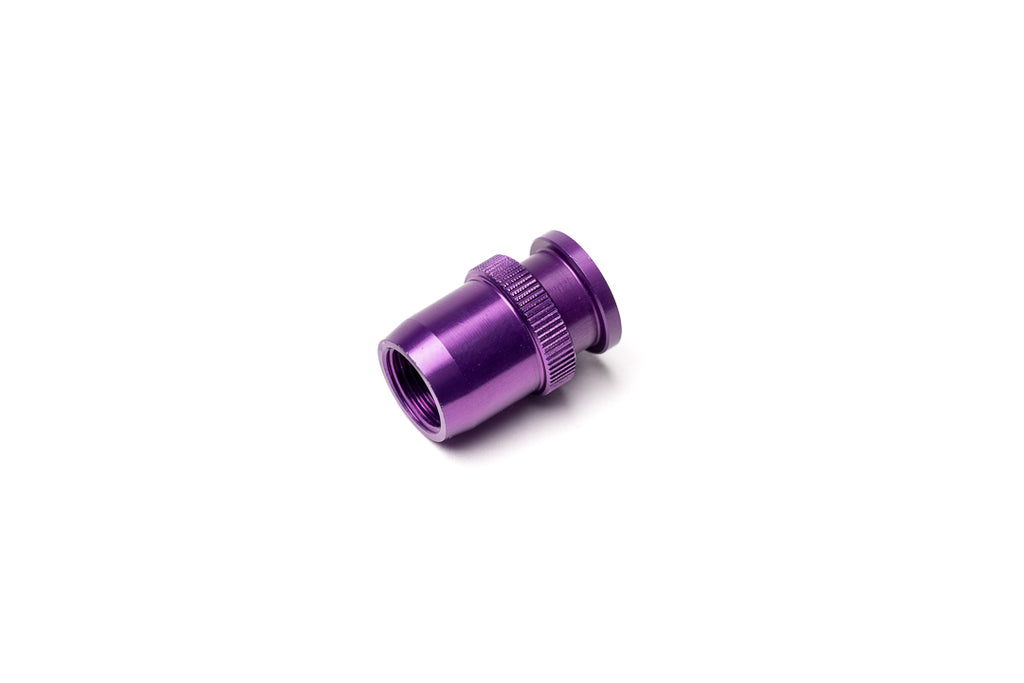 A purple soft release button from side on a white background. For Nikon AR-1.