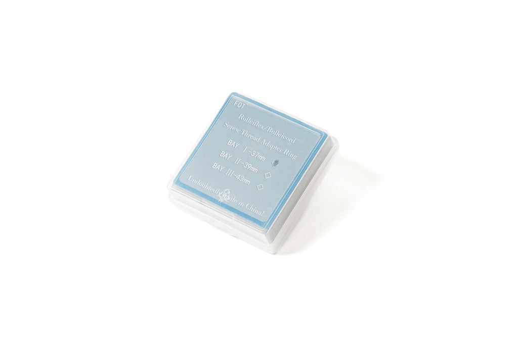A 37mm metal adapter with UV filter in a package. 