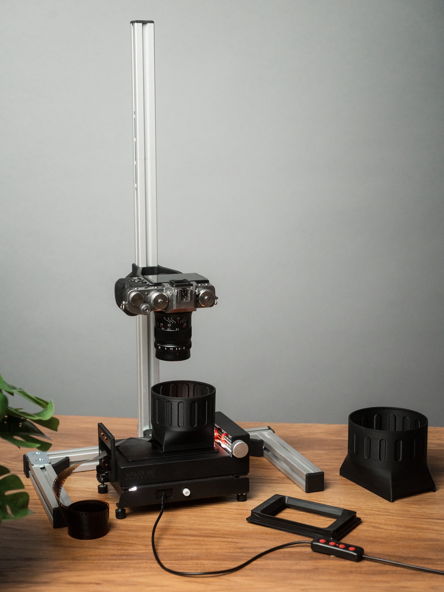 Valoi scanning kit with a camera on a wooden table. 