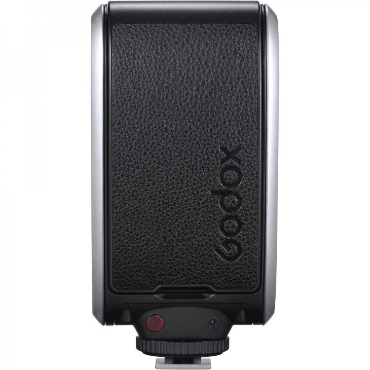 A Godox Lux Senior flash side on a white background.   