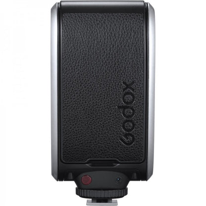 A Godox Lux Senior flash side on a white background.   