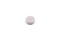 A battery on a white background. Varta SR43 1.55V.