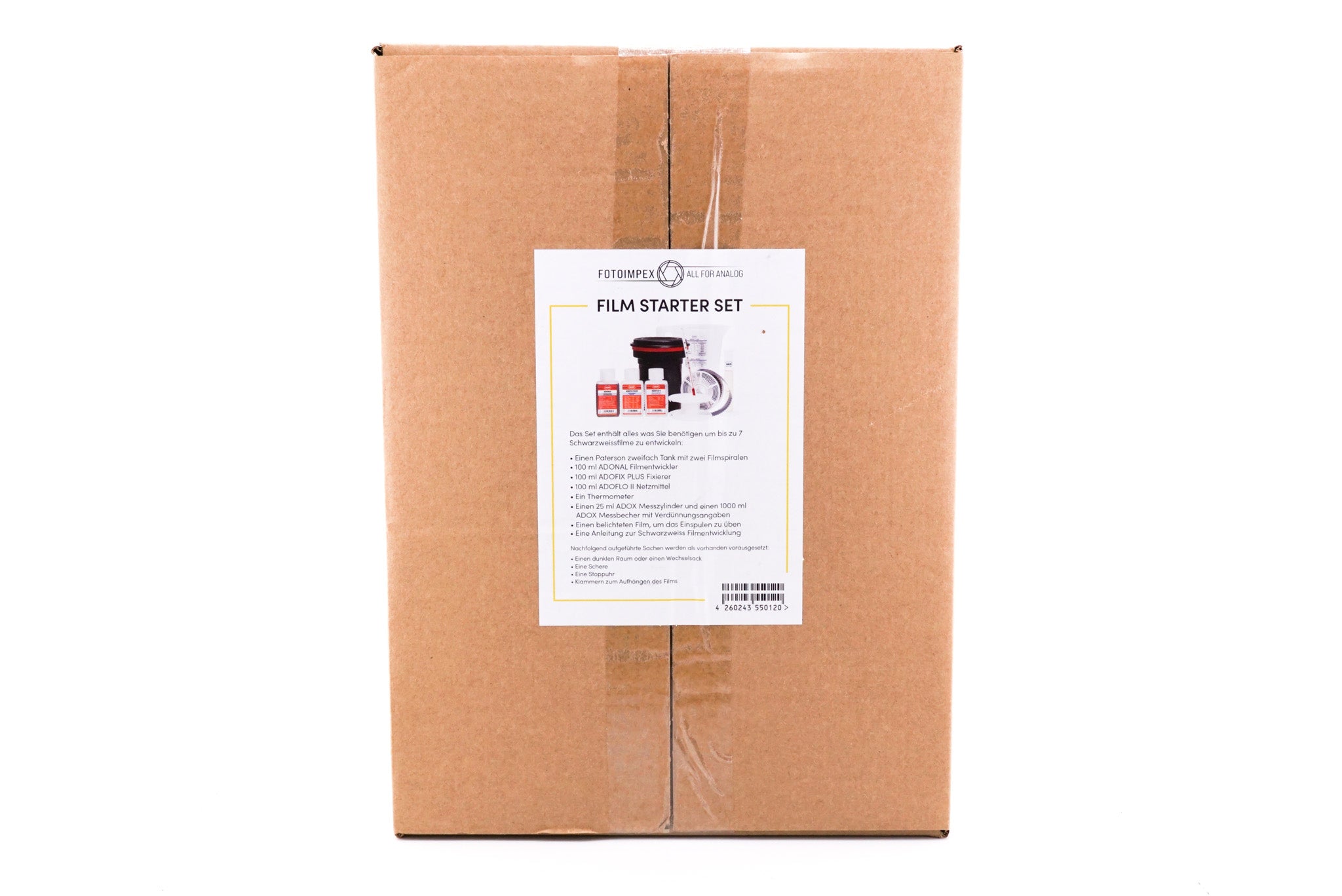 A FOTOIMPEX film developing starter kit packed in a box with a white background. 