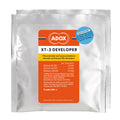 Adox XT-3 film developer packages on a white background. 