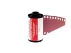 A close-up of Santacolor 100 film roll on a white background. 