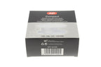 A plastic reel film developer in a package. For 35mm, 126mm, 127mm and 120/220 film.