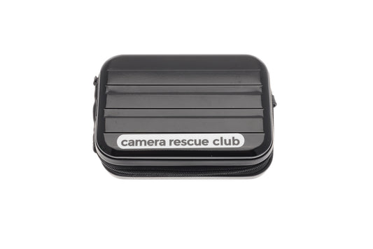 Camera Rescue Club case in black. Size 120 x 85 x 40mm. Includes a carabiner for hanging from a strap or bag.