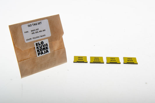 Elokuvakonepaja hot shoe ISO indicator box with four yellow indicators separately on a white background. 