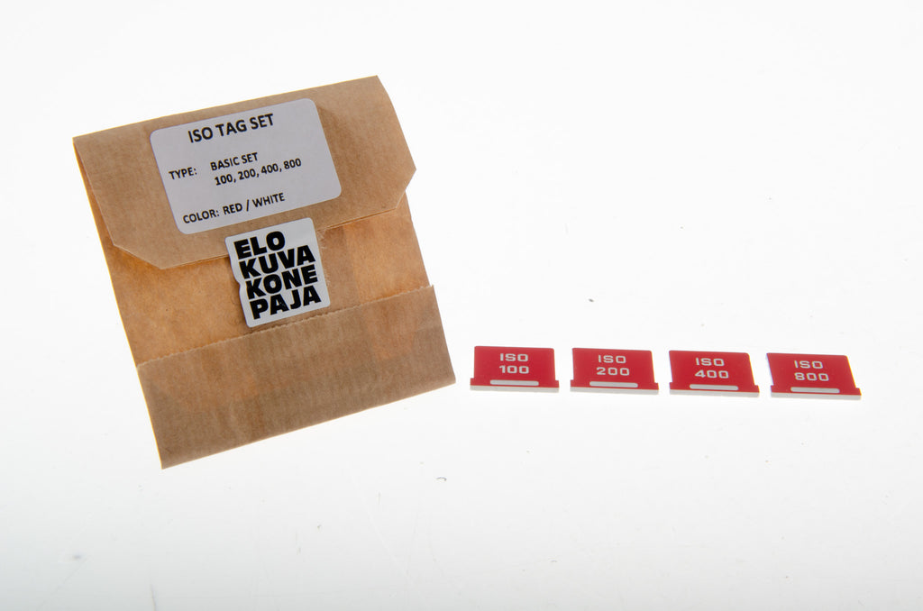 Elokuvakonepaja hot shoe ISO indicator box with four red indicators separately on a white background. 