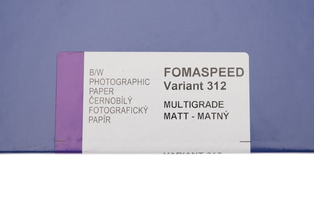 A close-up of a Foma Fomaspeed matt photographic paper sheet box info on a white background. 50 Sheets per box.