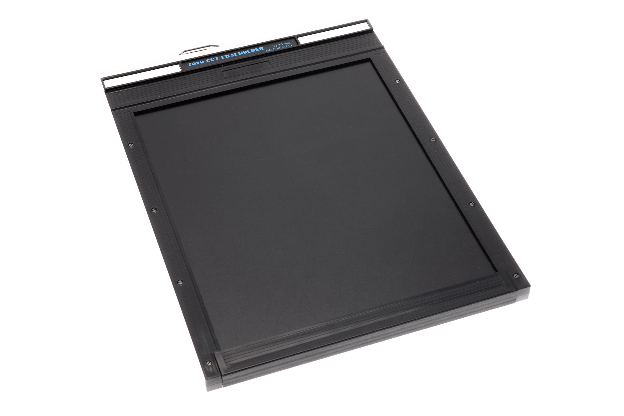Front view of a film holder on a white background. Toyo 8x10".
